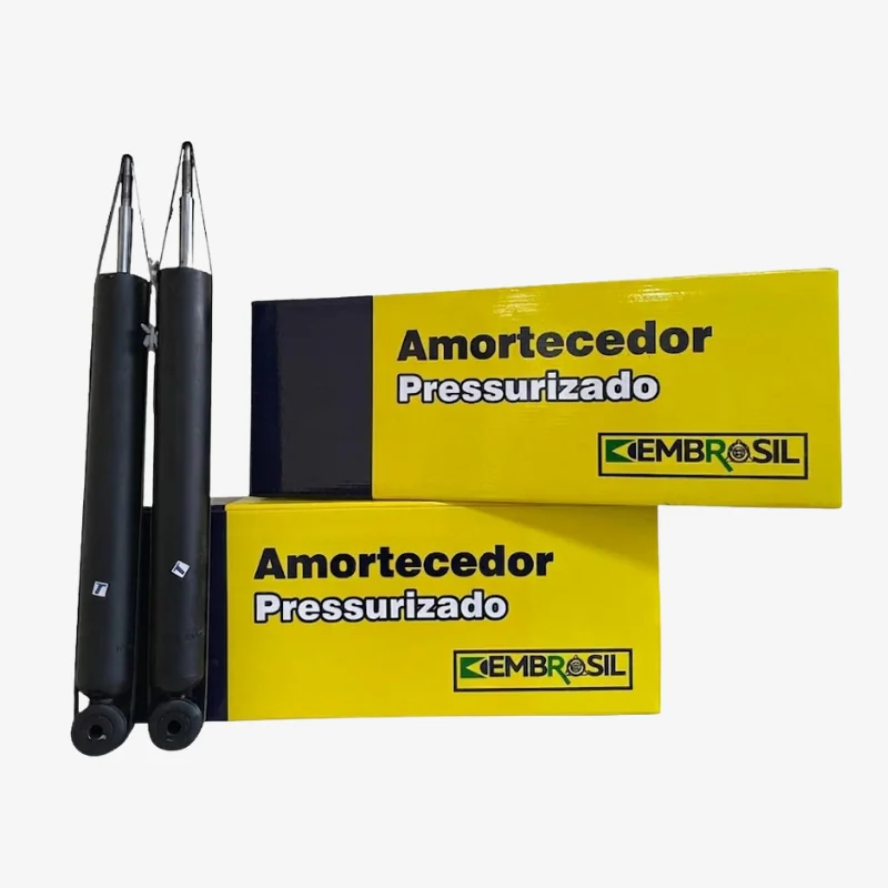Par de amortecedores pressurizados Embrasil ao lado das embalagens amarelas